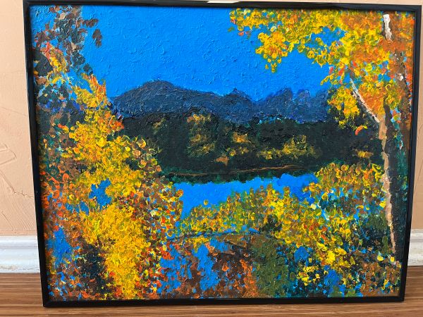 Aspen trees next to a lake